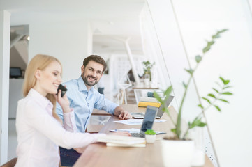 Sticker - Attractive man and woman are working with joy