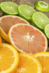 Wall Mural - slices of orange and lemon.