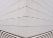 Abstract corner. Building corner of gray tiles.