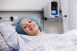 © famveldman - Young woman in hospital recovery room after surgery