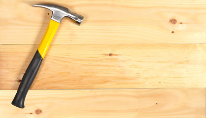 Wall Mural - Hammer wrench on wooden background