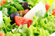 fresh vegetable salad with mozzarella cheese closeup