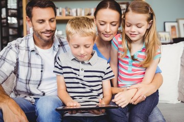 Poster - Cheerful family using technologies