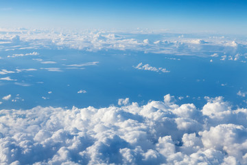 Wall Mural - blue sky with clouds. view from airplane