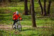 © Aleksey - Cyclist Riding the Bike in Beautiful Spring Forest
