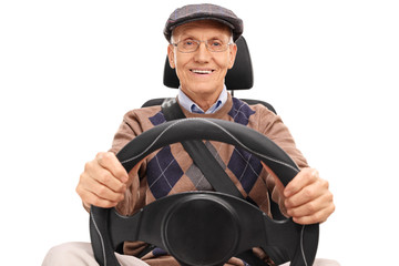 Poster - Senior driver holding a steering wheel