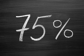 75 percent header written with a chalk on the blackboard