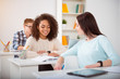 © zinkevych - Group of students studying in the classroom