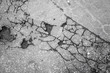 Old cracked grungy asphalt road background