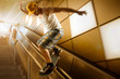 Skateboarder Slides down Stairs