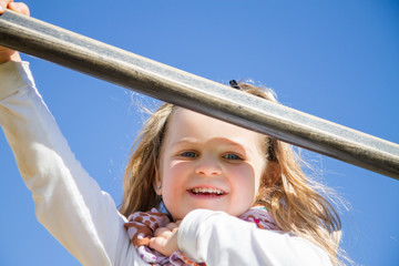 beautiful little girl in a playground