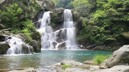 Wall Mural - double waterfall from ravine in lushan scenic area of lotus valley ,China