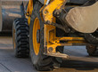 Wheel loader excavator machine working in construction site 