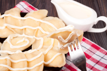 Wall Mural - Ukrainian dumplings vareniki with cottage cheese