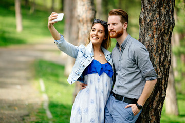 Beautiful couple in love taking slefies