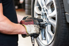 Removing Bolt From A Wheel  Using Pneumatic Gun, Tire Replacement
