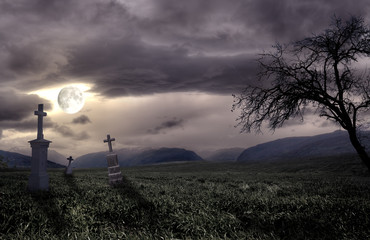 Wall Mural - Spooky Halloween graveyard with dark clouds