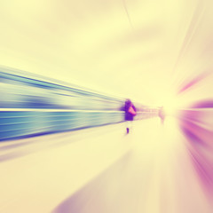 Wall Mural - Train in motion blur and blurred people in subway station.