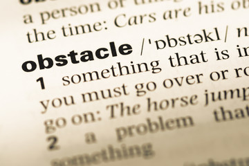 Wall Mural - close up of old english dictionary page with word obstacle