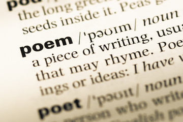 Wall Mural - close up of old english dictionary page with word poem