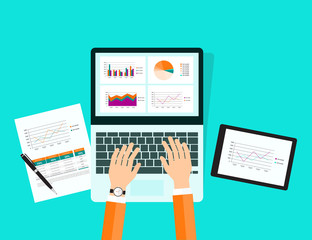 Wall Mural - graph in tablet device with report paper concept .business planning and business analytic concept .dashboard monitor.
