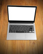 © denphumi - Laptop with blank screen  aluminium body