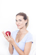 © Dan Kosmayer - Beautiful woman with red apple in hand