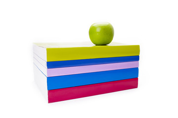 Wall Mural - green apple on top of colourful books