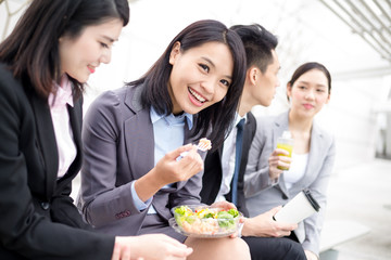 Business people having salad at lunch