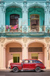 Classic vintage car and coloful colonial buildings in Old Havana, Cuba. Travel and tourism in Cuba