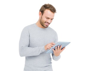 Wall Mural - Young man using digital tablet