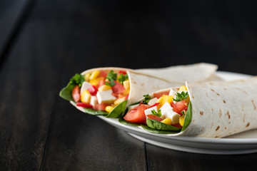 Poster - vegan tofu wraps with pepper, corn, tomatoes and spinach