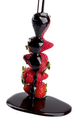 Canvas Print - strawberries in stick with melted chocolate