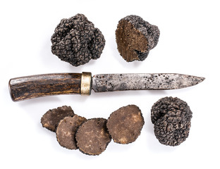 Sticker - Black truffles isolated on a white background.