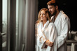© NDABCREATIVITY - Couple relaxing in bathrobe