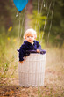 © trishamorning - Little girl playing with balloons