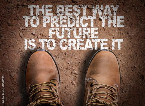 Fotografie, Obraz Top View of Boot on the trail with the text: The Best Way to Predict Your Future