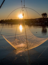 Fishing Net On The Tuscan Sea At Sunset