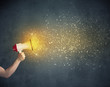 © ra2 studio - Hand holding megaphone
