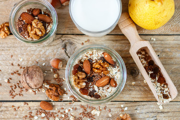 Wall Mural - Homemade granola with nuts, raisins and seeds a healthy Breakfast