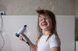 © natalialeb - baby little Girl dries hair, sisters taking care of yourself, th