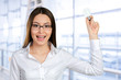 © fotofabrika - Portrait of a young businesswoman having a brilliant idea
