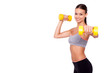 Feeling awesome! Looking even better! Shot of a beautiful and sporty young woman lifting up weights against white background.