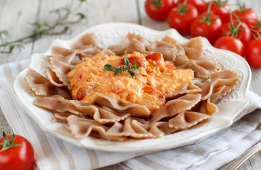 Wall Mural - Wholegrain Pasta with stracchino cheese and fresh tomatoes