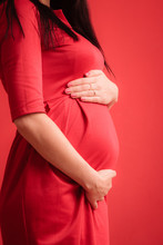 Closeup On Tummy Of Pregnant Woman