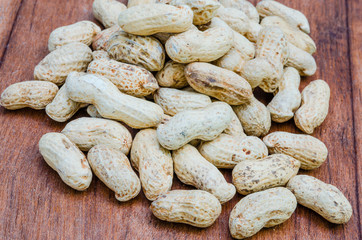 Peanuts  on wood background