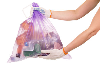 Wall Mural - Full garbage bag in her hands closeup isolated on white