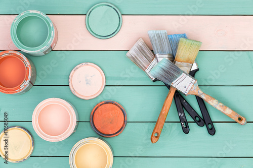 Fotografie, Obraz Colorful selection of wood stains and paintbrushes