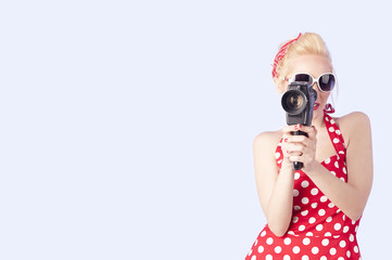 Pin up girl with vintage camera 8 mm 