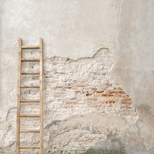 Weathered Stucco Wall With Wooden Ladder Background